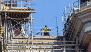 West Covina Scaffolding Rental crew erecting a large scaffold system at a construction site