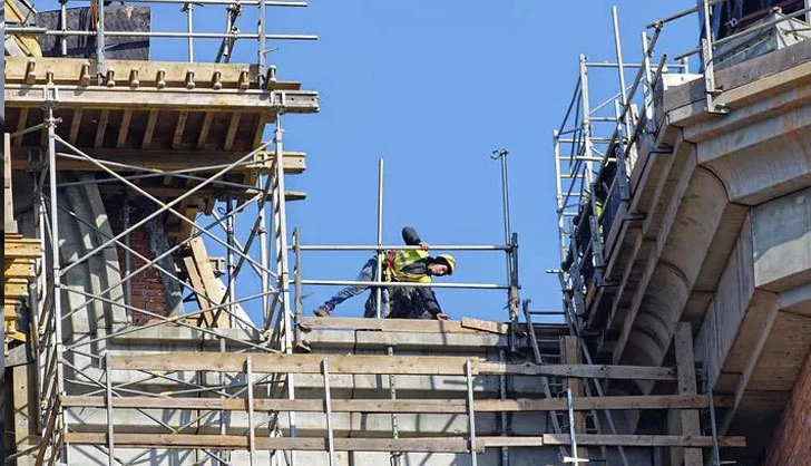 West Covina Scaffolding Rental crew erecting a large scaffold system at a construction site