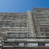 West Covina Scaffolding Rental high-rise exterior scaffold system covering a large building