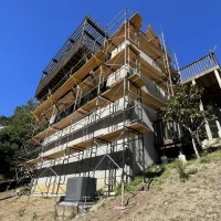 West Covina Scaffolding Rental hillside residential scaffold system surrounding a multi-story home