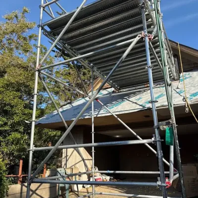 West Covina Scaffolding Rental residential scaffold tower installed beside a home renovation project