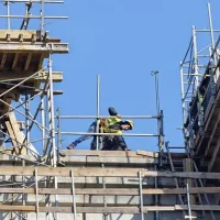 West Covina Scaffolding Rental crew erecting a large scaffold system at a construction site